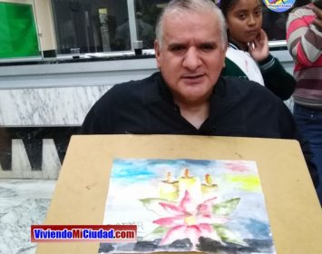 Joel Ramos en el Dia Munidal Pintor Boca y Pie